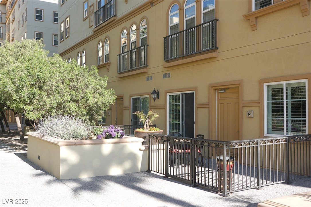 2405 East Serene Avenue, Unit 241 Las Vegas, NV 89123 - Photo 3 of 17 View of unit's exterior landscaping and gated pati