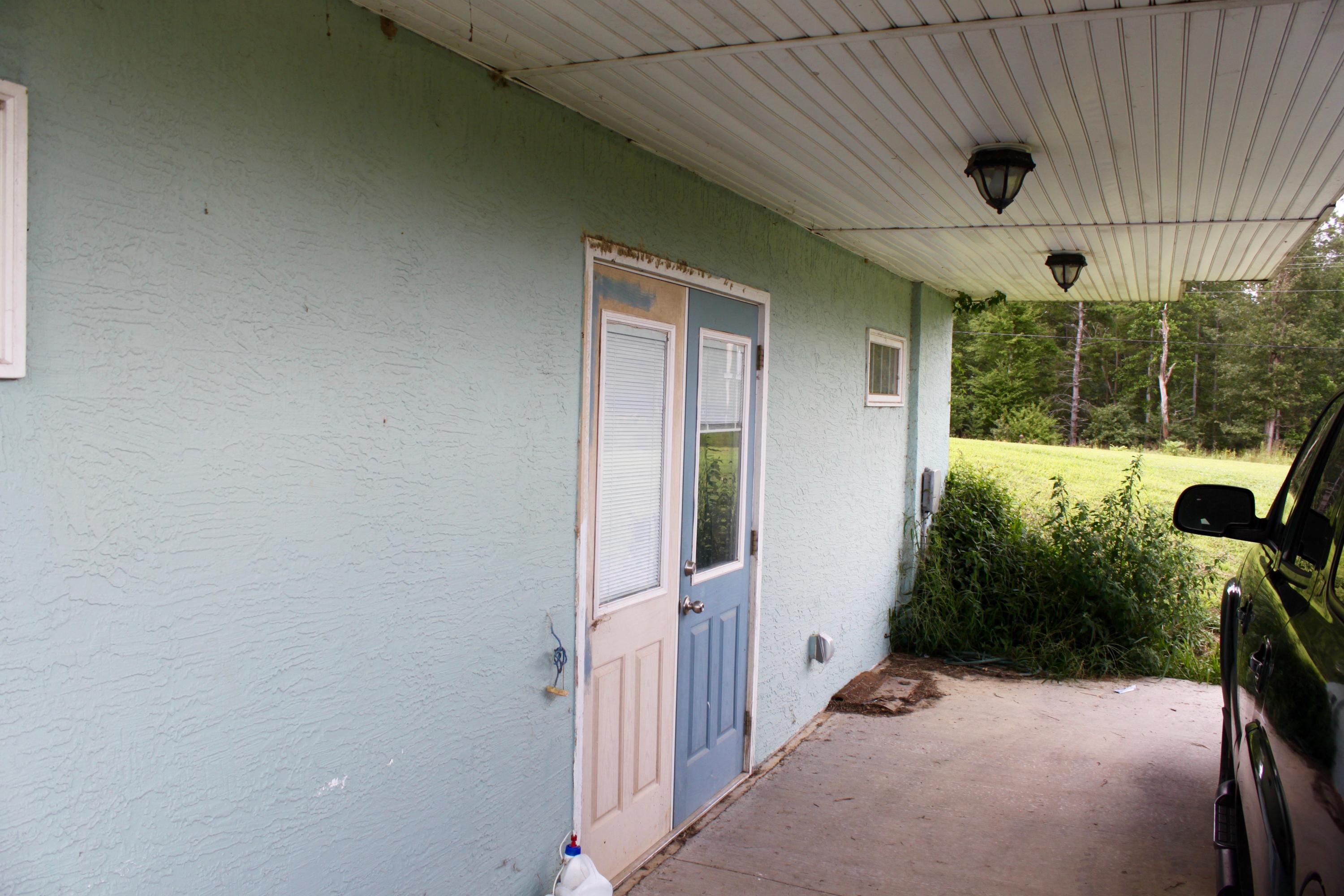 1155 Twin Bridge Road Deer Lodge, TN 37726 - Photo 4 of 39 Basement Ent Outside
