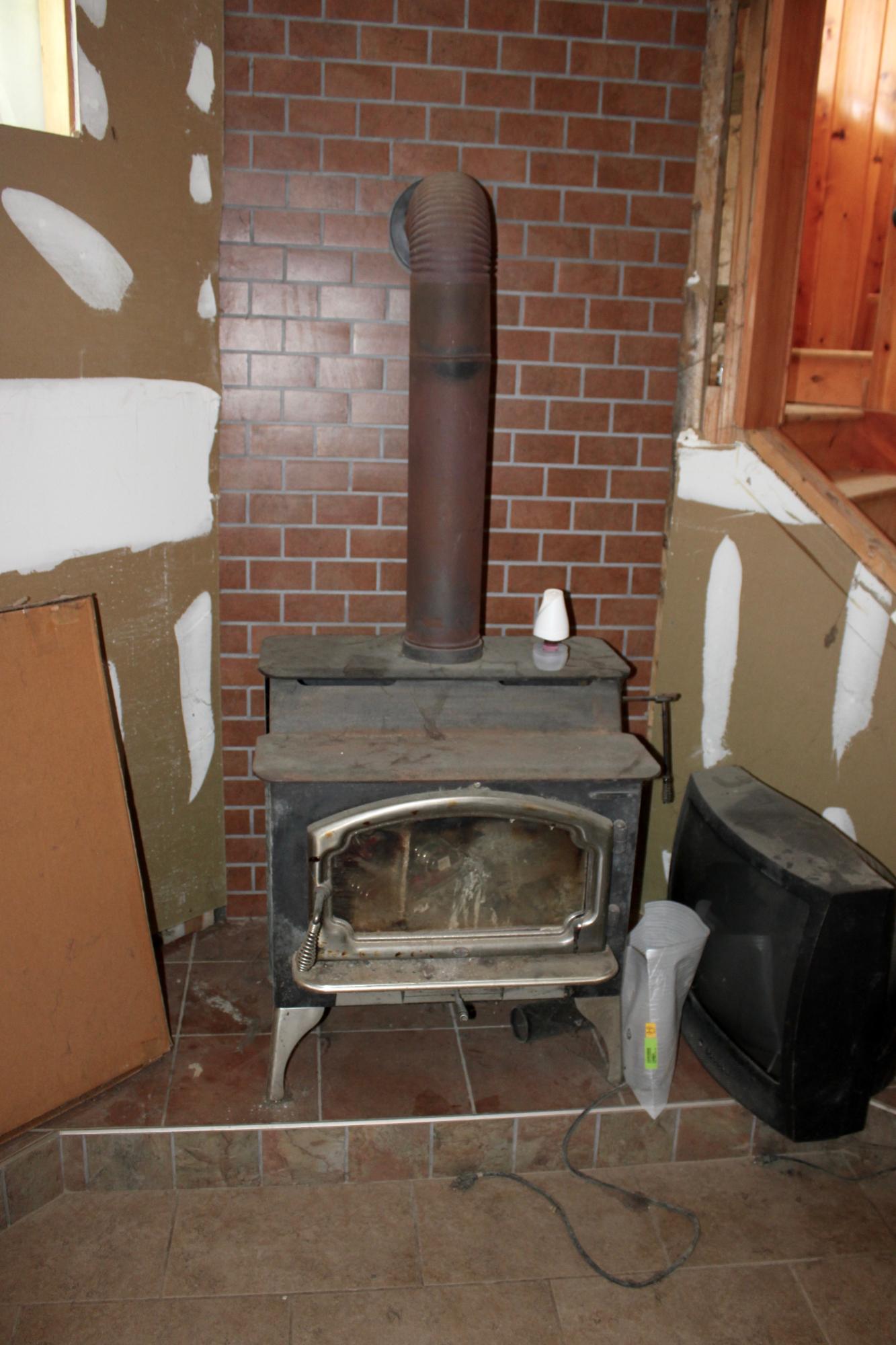 1155 Twin Bridge Road Deer Lodge, TN 37726 - Photo 36 of 39 Basement Wood Stove