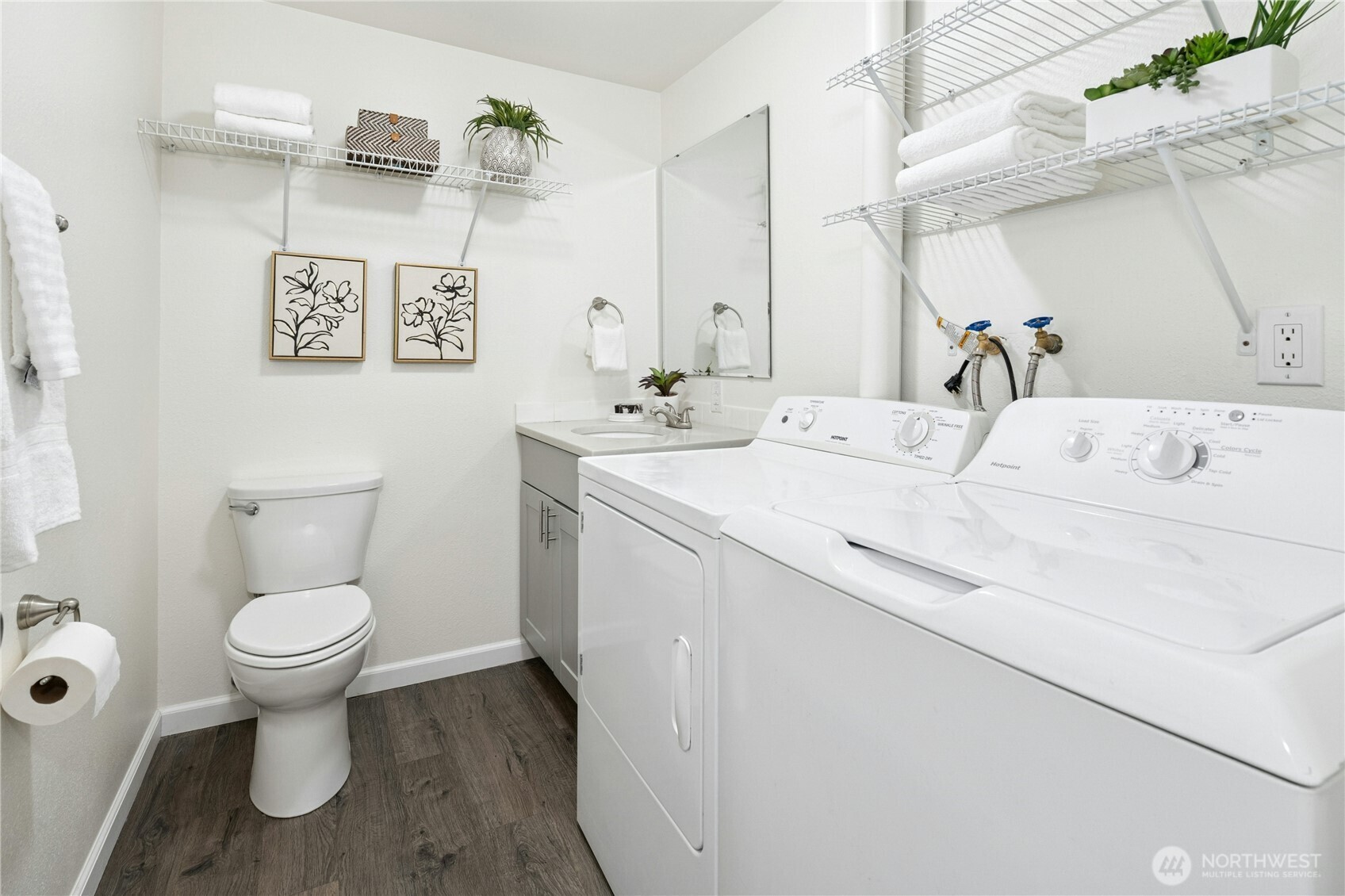 7909 218th Street Southwest, Unit 6 Edmonds, WA 98026 - Photo 17 of 27 a bathroom with a sink toilet and a mirror