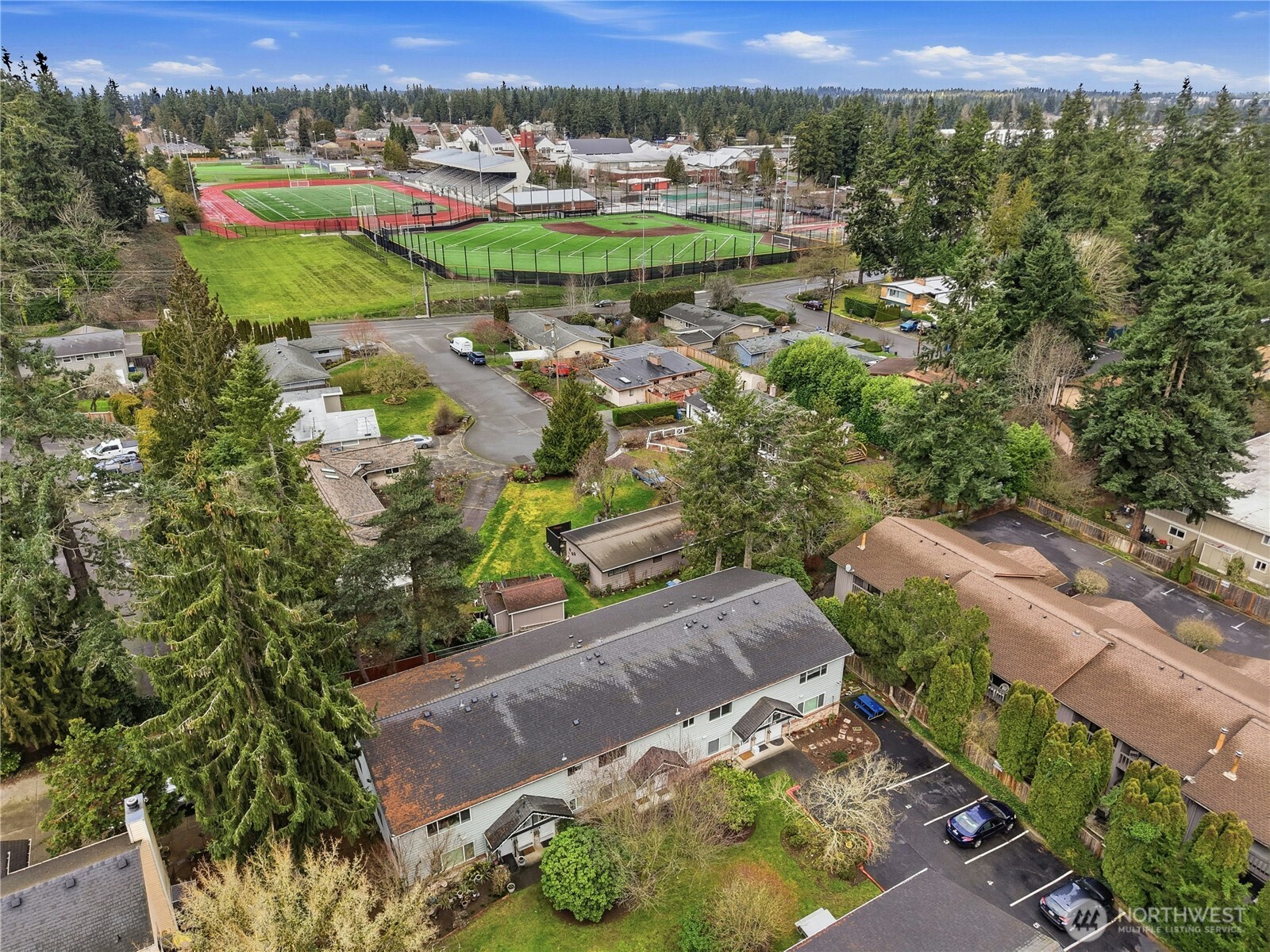 7909 218th Street Southwest, Unit 6 Edmonds, WA 98026 - Photo 20 of 27 an aerial view of a house with a yard basket ball court and outdoor seating