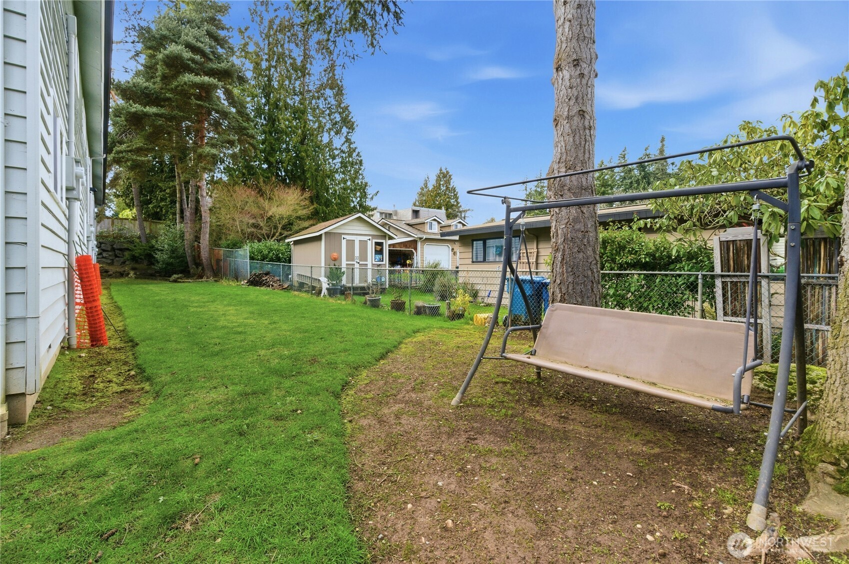 7909 218th Street Southwest, Unit 6 Edmonds, WA 98026 - Photo 22 of 27 a view of a chair and table in the garden