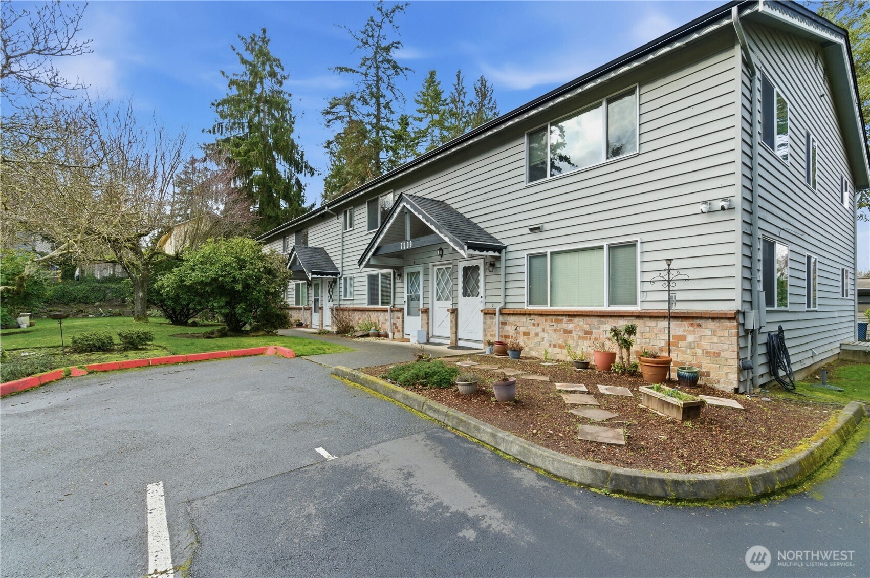 7909 218th Street Southwest, Unit 6 Edmonds, WA 98026 - Photo 25 of 27 a view of a house with pool
