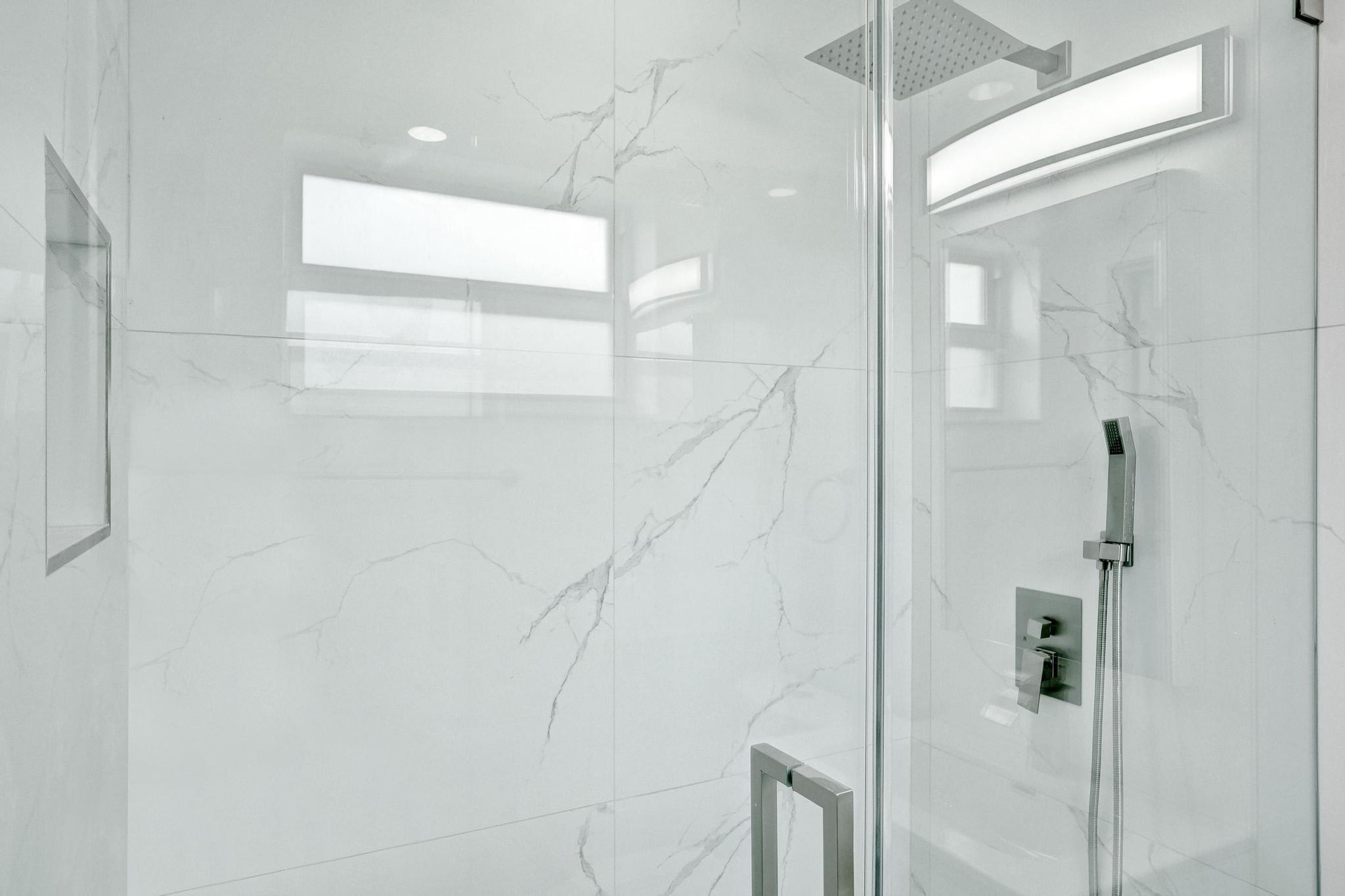7341 Meridian Street Miramar, FL 33023 - Photo 12 of 74 a bathroom with a shower