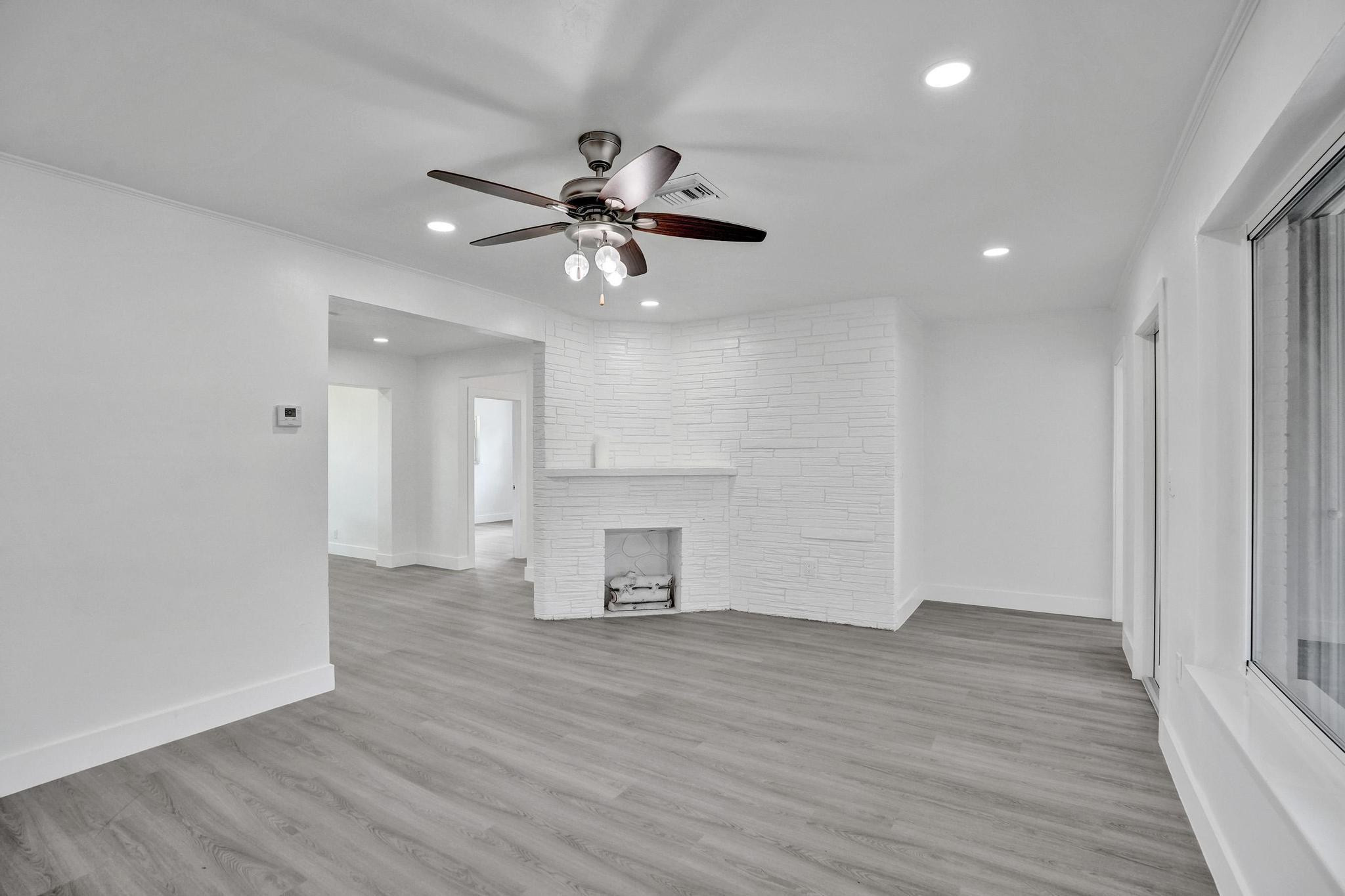 7341 Meridian Street Miramar, FL 33023 - Photo 15 of 74 wooden floor in an empty room with a window