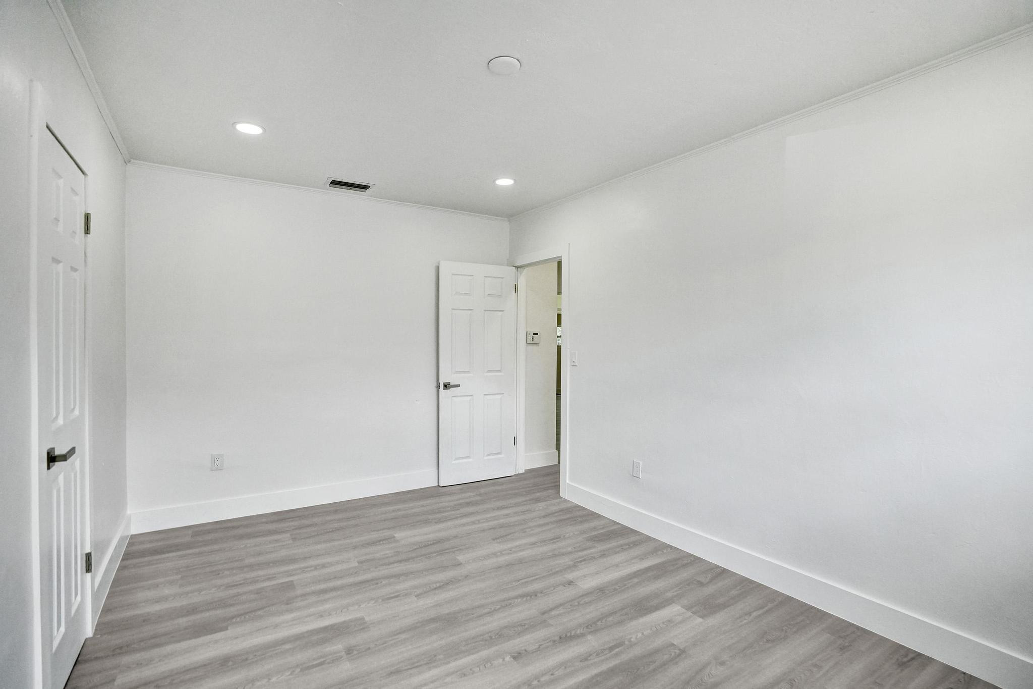 7341 Meridian Street Miramar, FL 33023 - Photo 55 of 74 a view of empty room with wooden floor