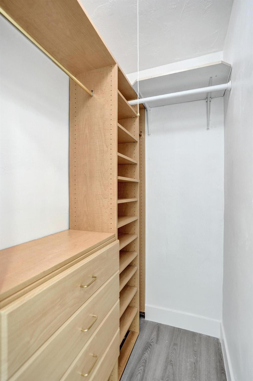 7341 Meridian Street Miramar, FL 33023 - Photo 58 of 74 a view of walk in closet with empty racks