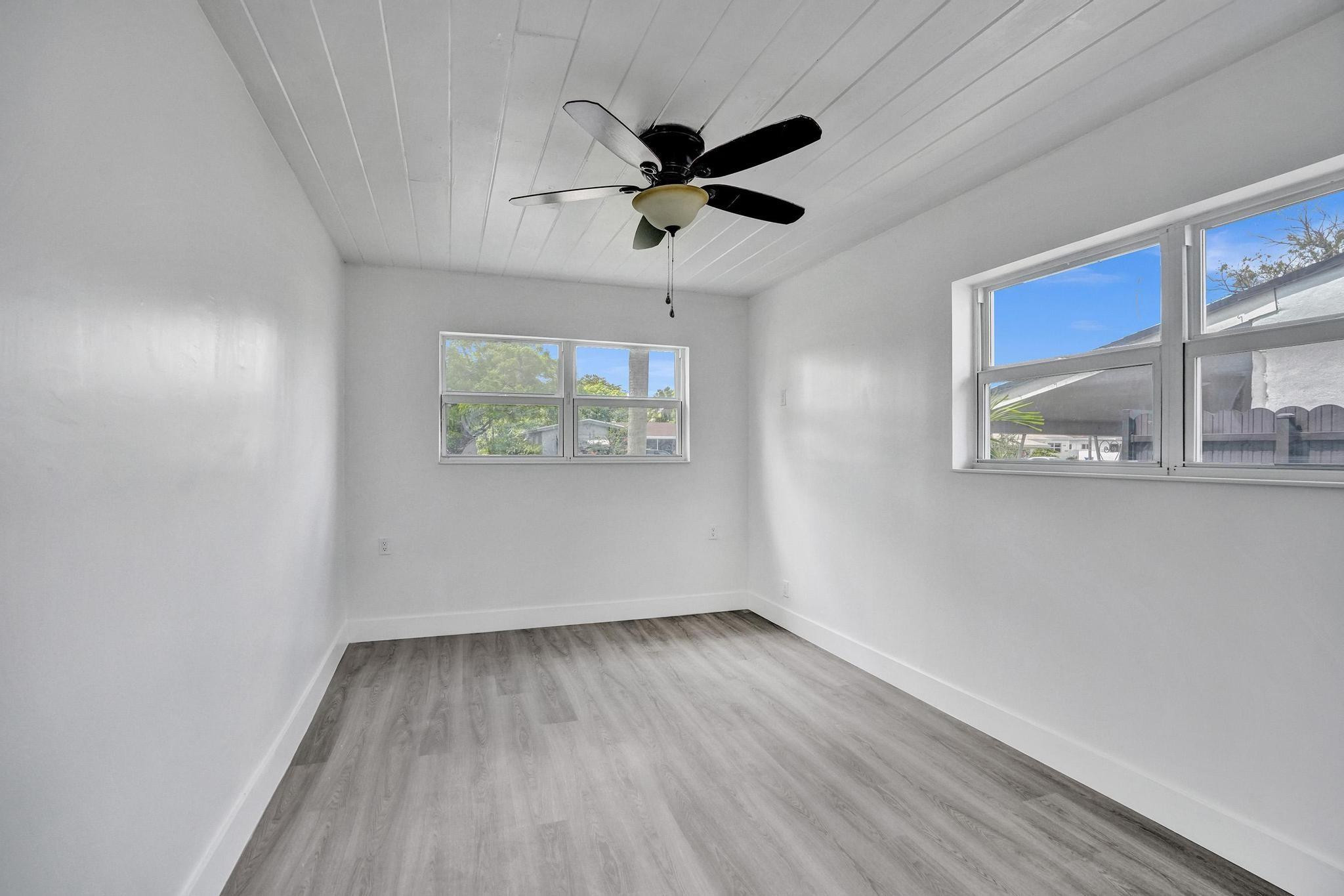 7341 Meridian Street Miramar, FL 33023 - Photo 62 of 74 a view of empty room with wooden floor