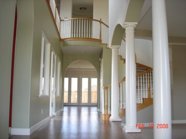10000 Burghley Lane Reno, NV 89521 - Photo 2 of 9 a view of an entryway with wooden floor