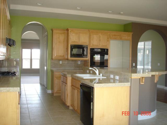 10000 Burghley Lane Reno, NV 89521 - Photo 4 of 9 a en suite bathroom with a granite countertop sink and a large mirror