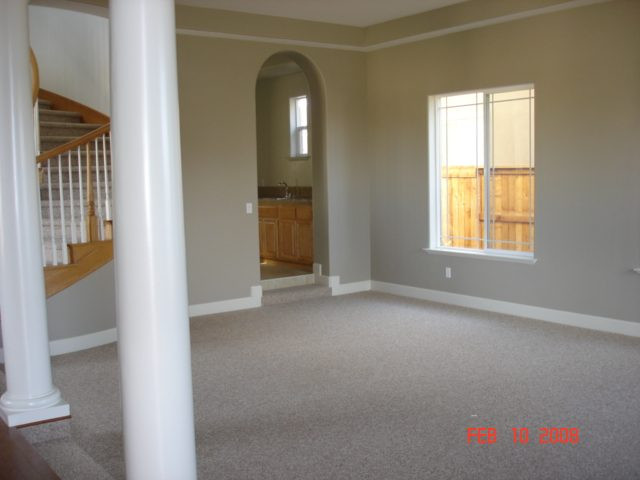 10000 Burghley Lane Reno, NV 89521 - Photo 5 of 9 an empty room with windows
