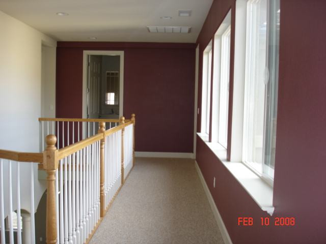 10000 Burghley Lane Reno, NV 89521 - Photo 8 of 9 a view of a hallway with windows