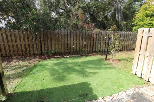 a view of backyard with green space