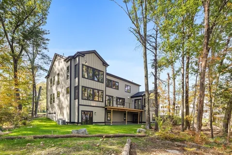 a view of a building with a yard