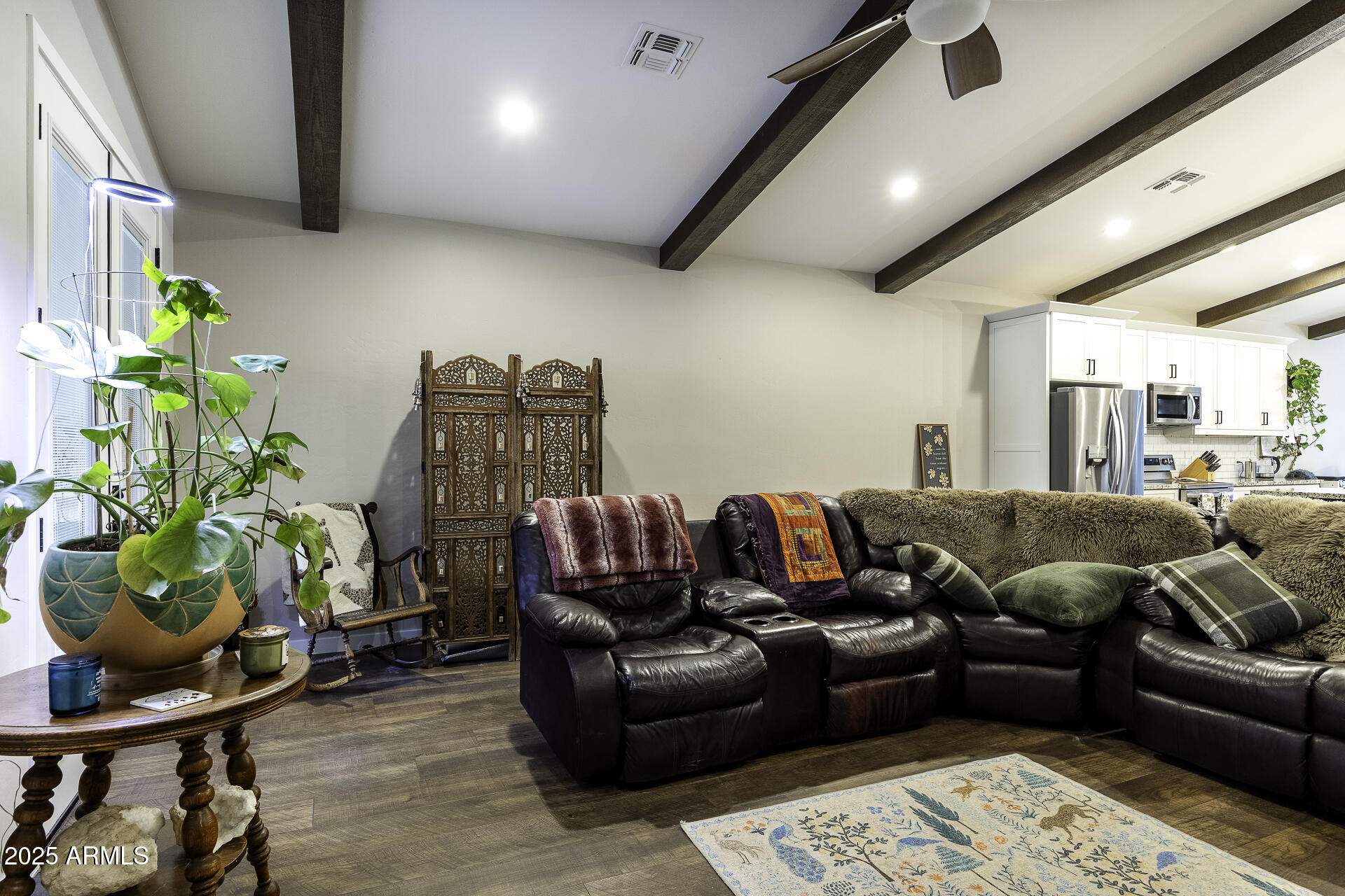 943 East Kortsen Road, Unit 2 Casa Grande, AZ 85122 - Photo 14 of 43 a living room with furniture and a potted plant