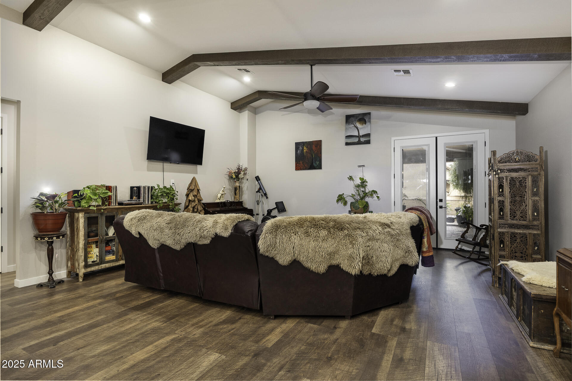 943 East Kortsen Road, Unit 2 Casa Grande, AZ 85122 - Photo 15 of 43 a spacious bedroom with a bed and a flat screen tv