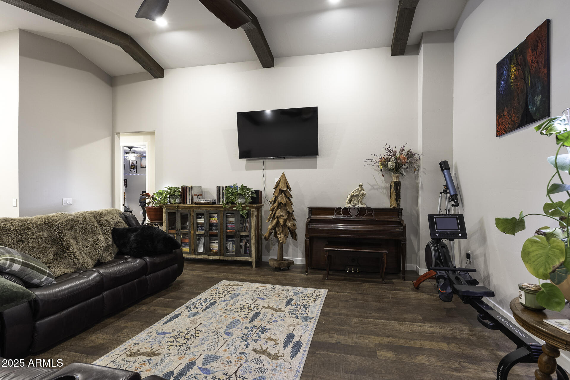 943 East Kortsen Road, Unit 2 Casa Grande, AZ 85122 - Photo 16 of 43 a living room with furniture and a flat screen tv