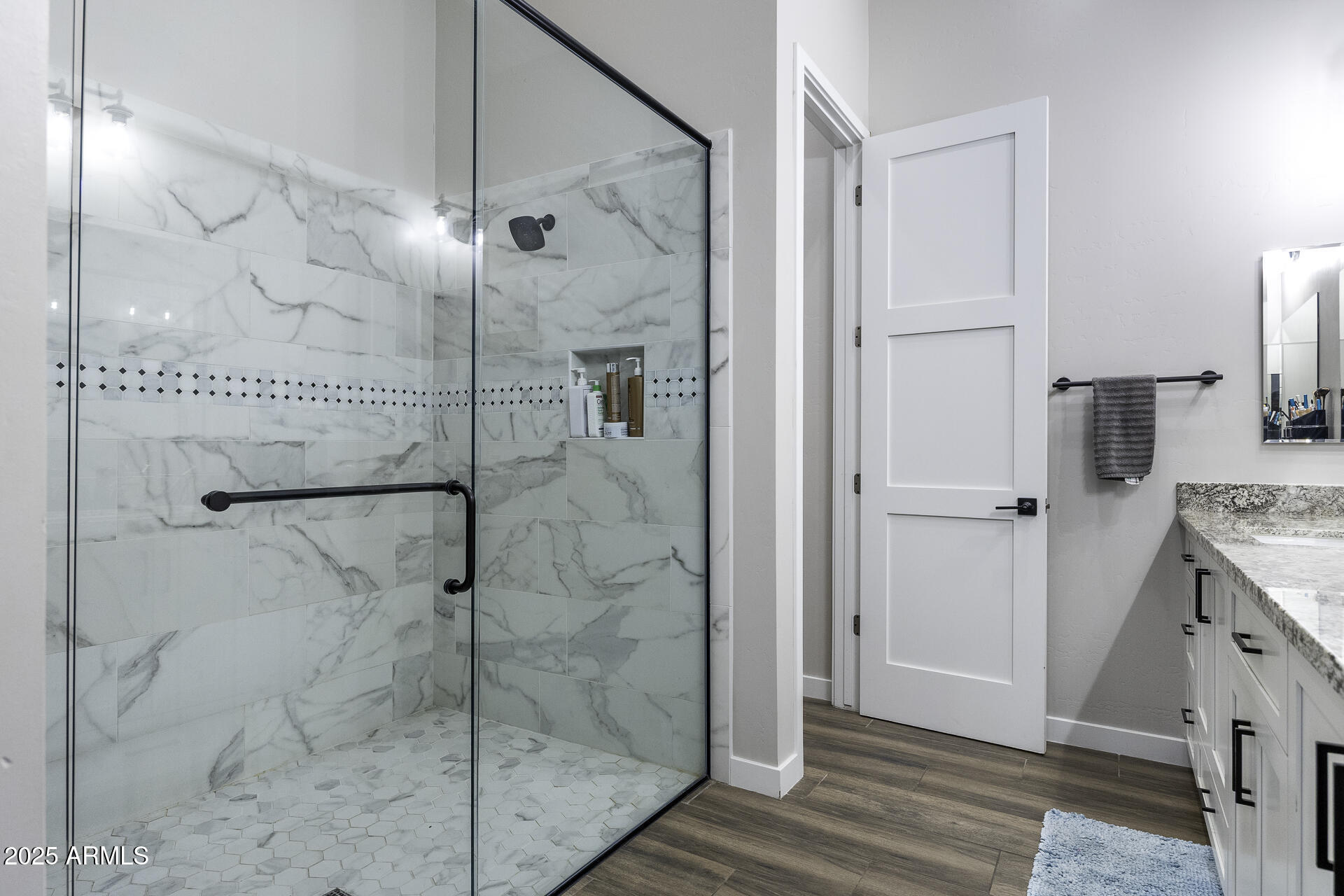 943 East Kortsen Road, Unit 2 Casa Grande, AZ 85122 - Photo 24 of 43 a bathroom with a shower and a sink