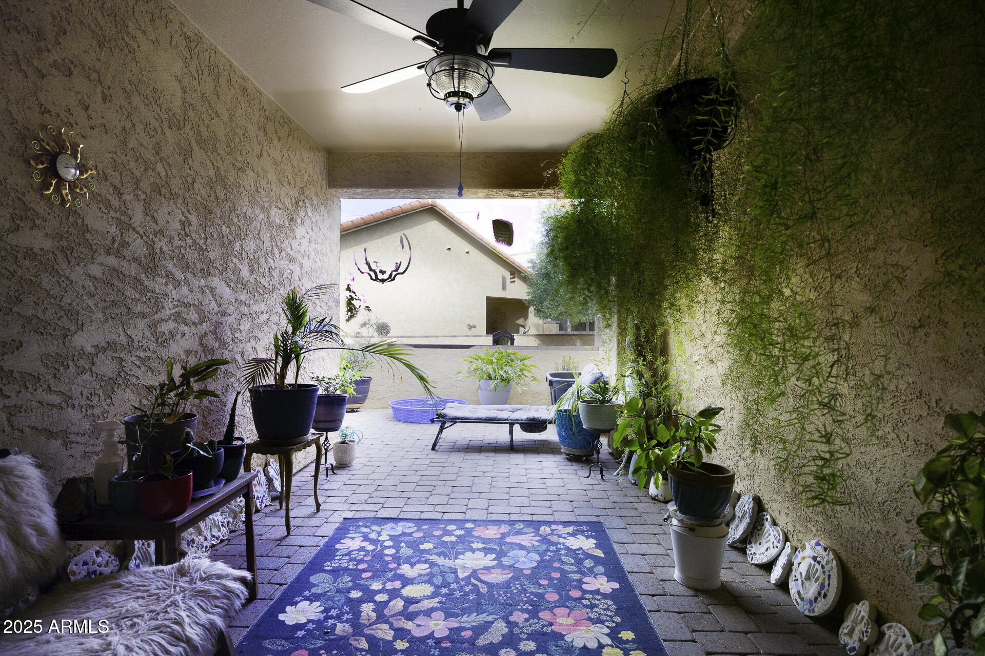 943 East Kortsen Road, Unit 2 Casa Grande, AZ 85122 - Photo 34 of 43 a living room with furniture and a potted plant
