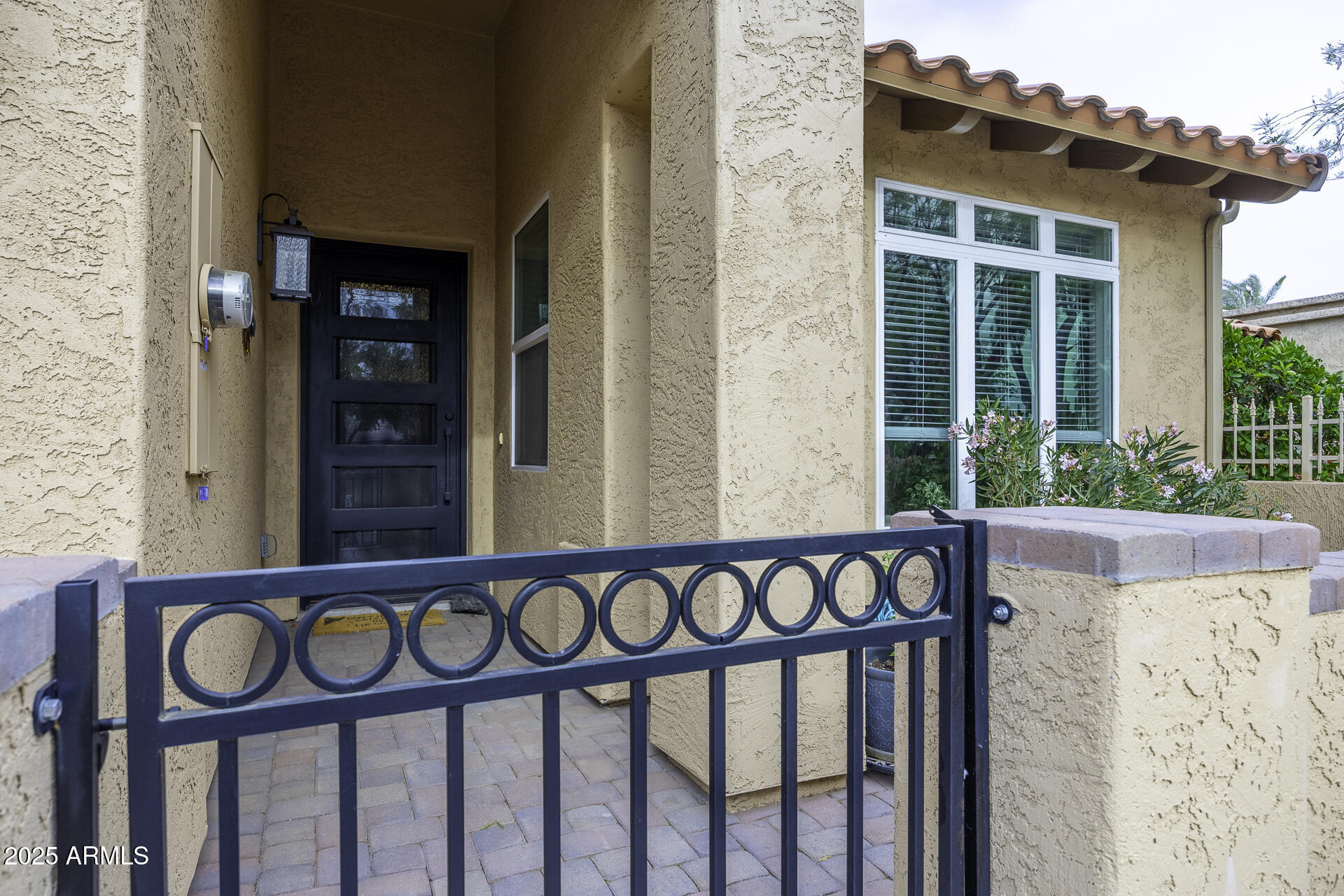 943 East Kortsen Road, Unit 2 Casa Grande, AZ 85122 - Photo 4 of 43 a front view of a house with a small yard
