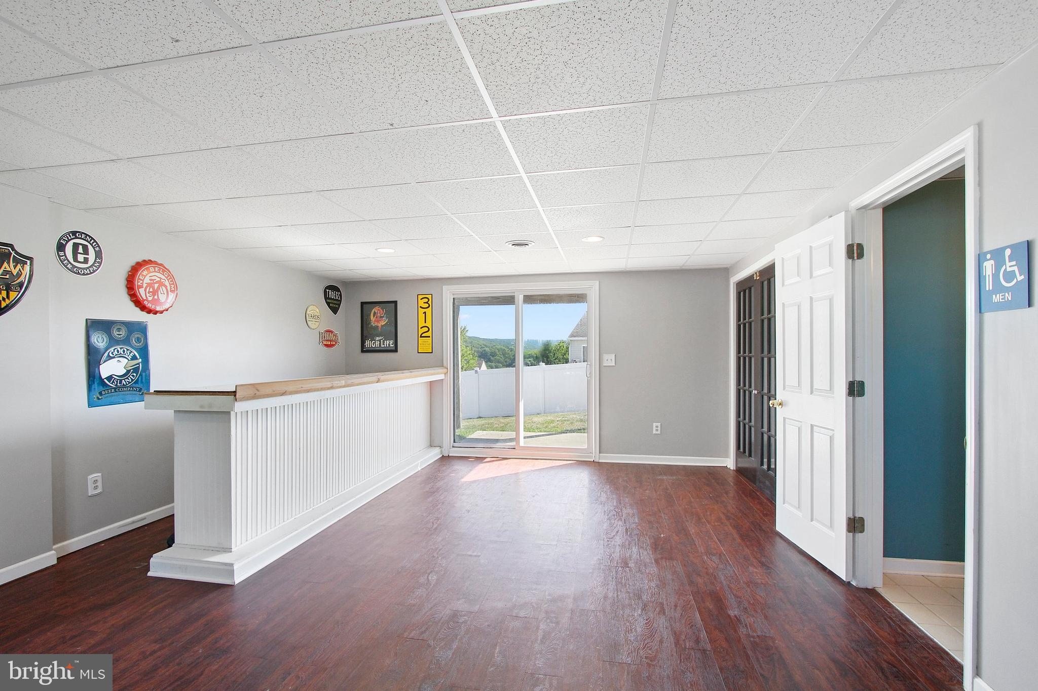 35 Coventry Cross Road Mount Wolf, PA 17347 - Photo 18 of 28 Finished Basement view of bar area and slider
