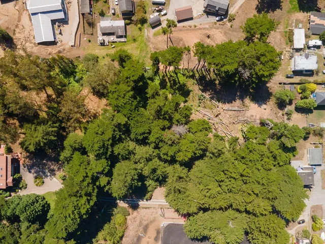 an aerial view of residential house with outdoor space