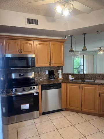 $320,000 | 301 Southwest 158th Terrace, Unit 104, Pembroke Pines, FL 33027