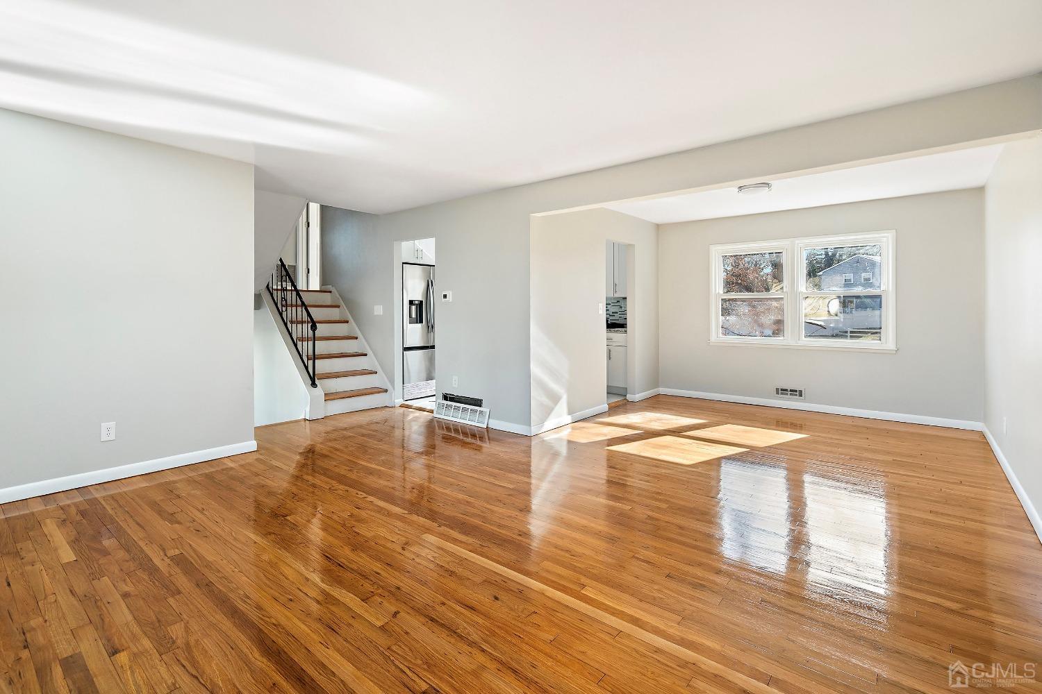 11 Hill Road Edison, NJ 08817 - Photo 11 of 24 a view of empty room with wooden floor
