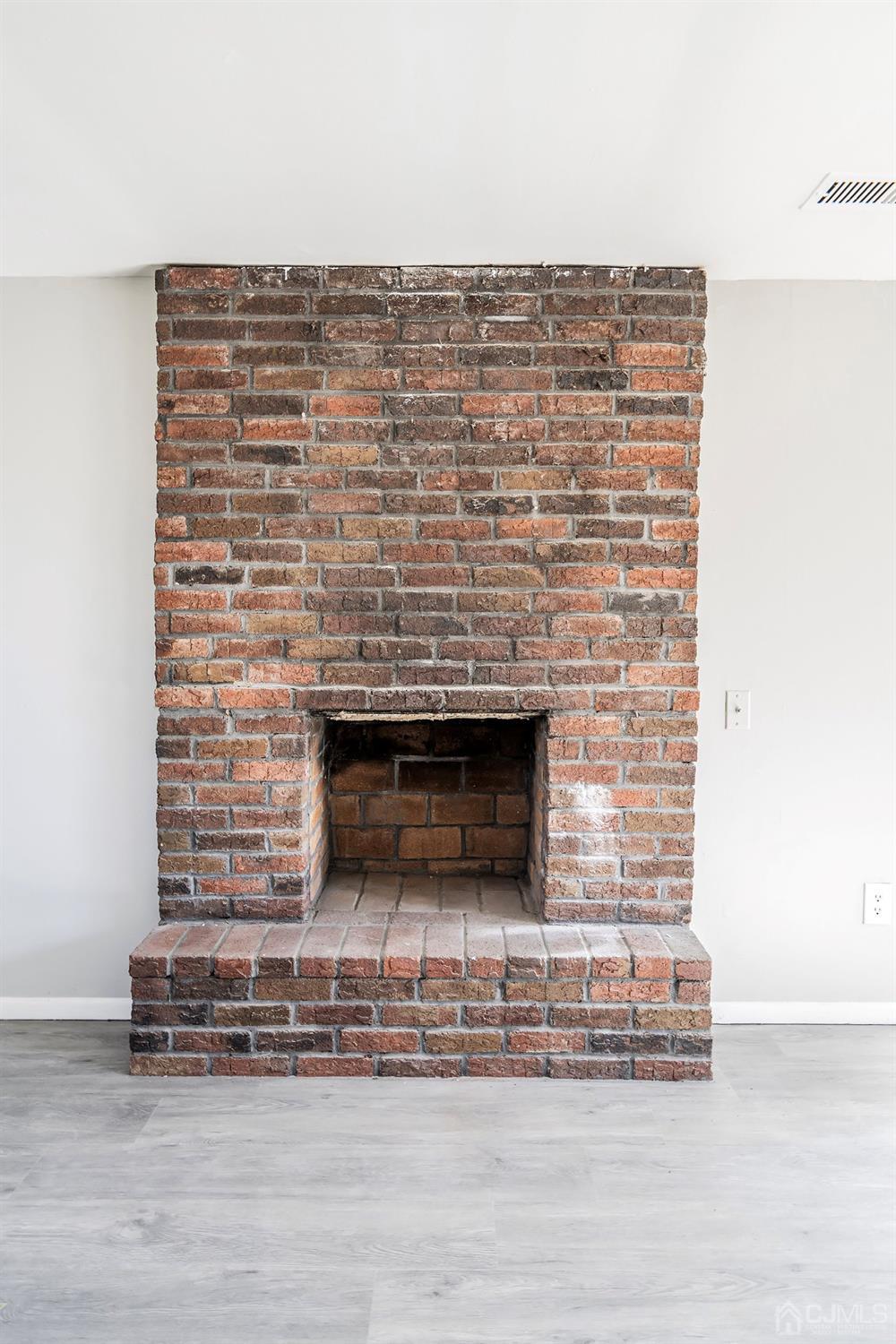 11 Hill Road Edison, NJ 08817 - Photo 5 of 24 a building with a brick wall