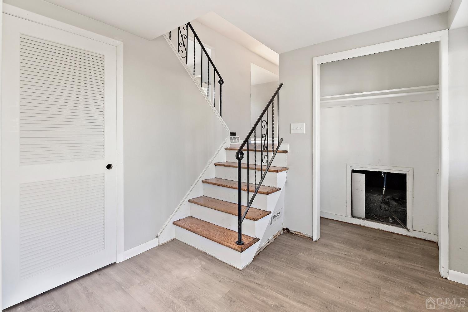 11 Hill Road Edison, NJ 08817 - Photo 7 of 24 a view of entryway and hall with wooden floor