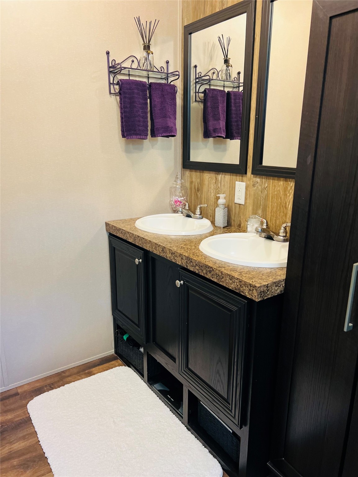 73 County Road 3703 Splendora, TX 77372 - Photo 13 of 14 a bathroom with a sink and a mirror