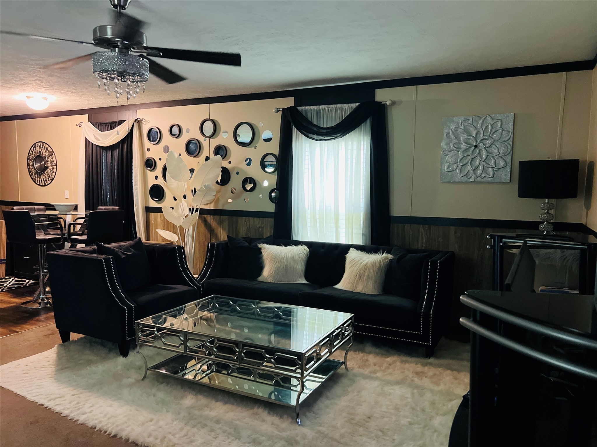 73 County Road 3703 Splendora, TX 77372 - Photo 3 of 14 a living room with furniture and a flat screen tv