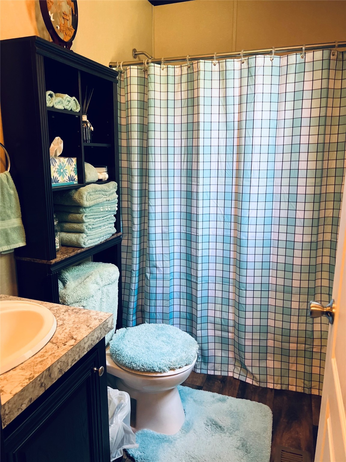 73 County Road 3703 Splendora, TX 77372 - Photo 10 of 14 a bathroom with a granite countertop toilet and sink