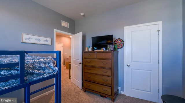 a room with furniture and flat screen tv