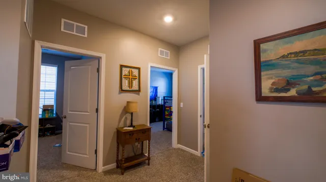 a view of a hallway with workspace