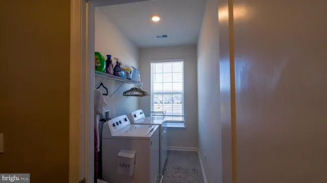 a bathroom with a sink a mirror and a bathtub