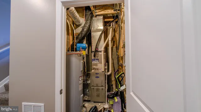 a view of a house with backyard sitting area and porch