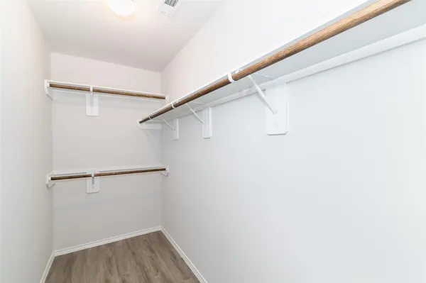 a view of small space with racks on the wall