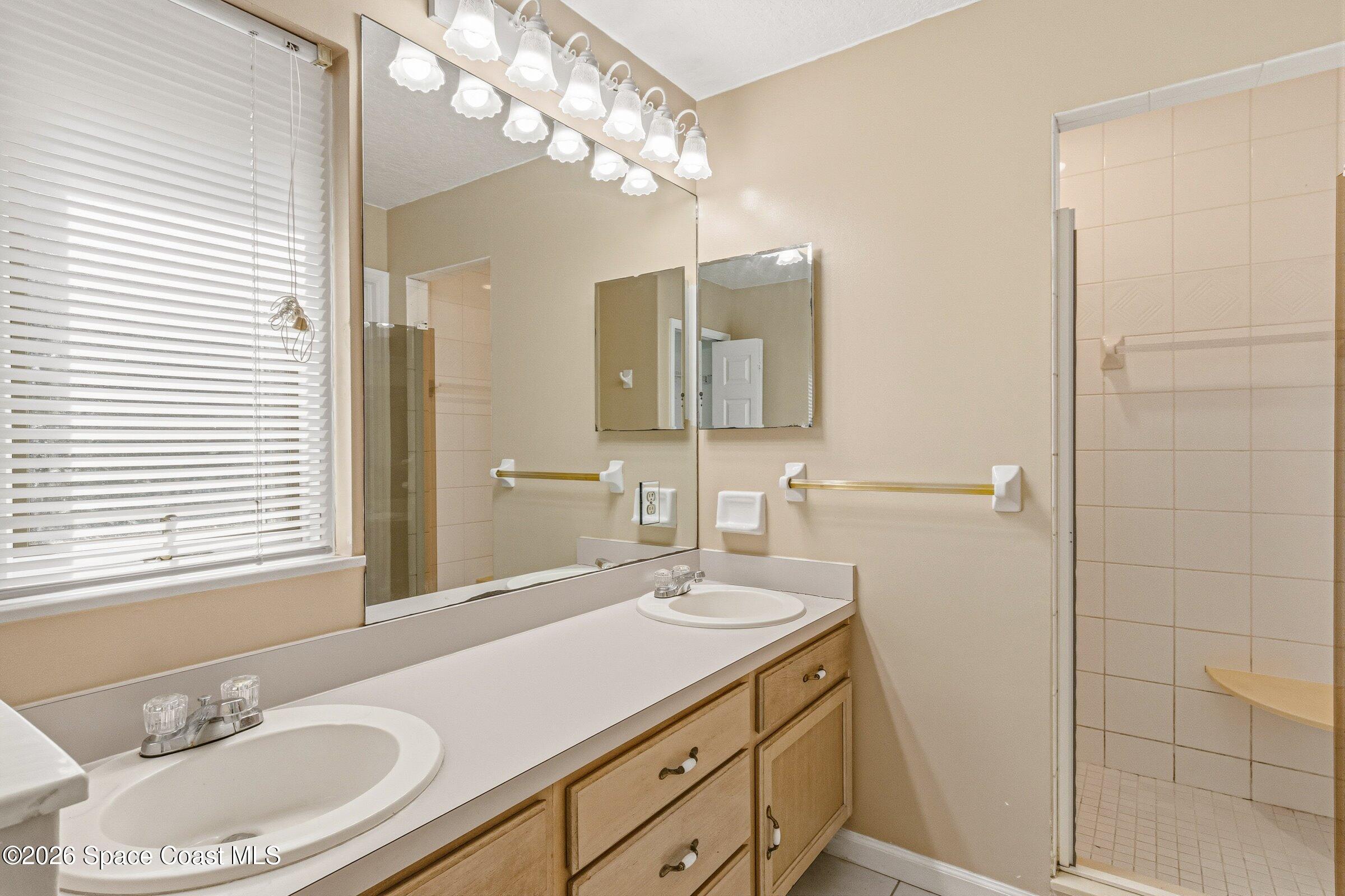 693 West Pine Road Melbourne Village, FL 32904 - Photo 12 of 65 27-693-W-Pine-Primary Bath