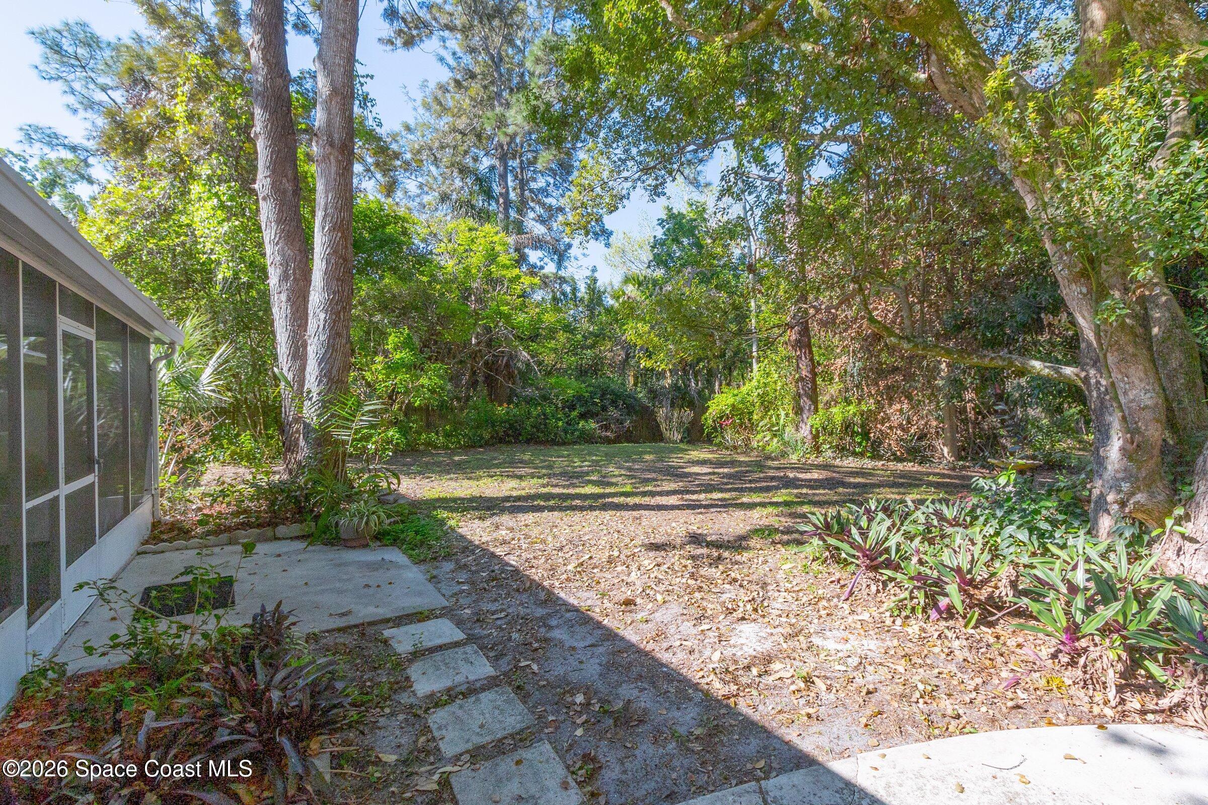 693 West Pine Road Melbourne Village, FL 32904 - Photo 27 of 65 33-693-W-Pine-Backyard 1
