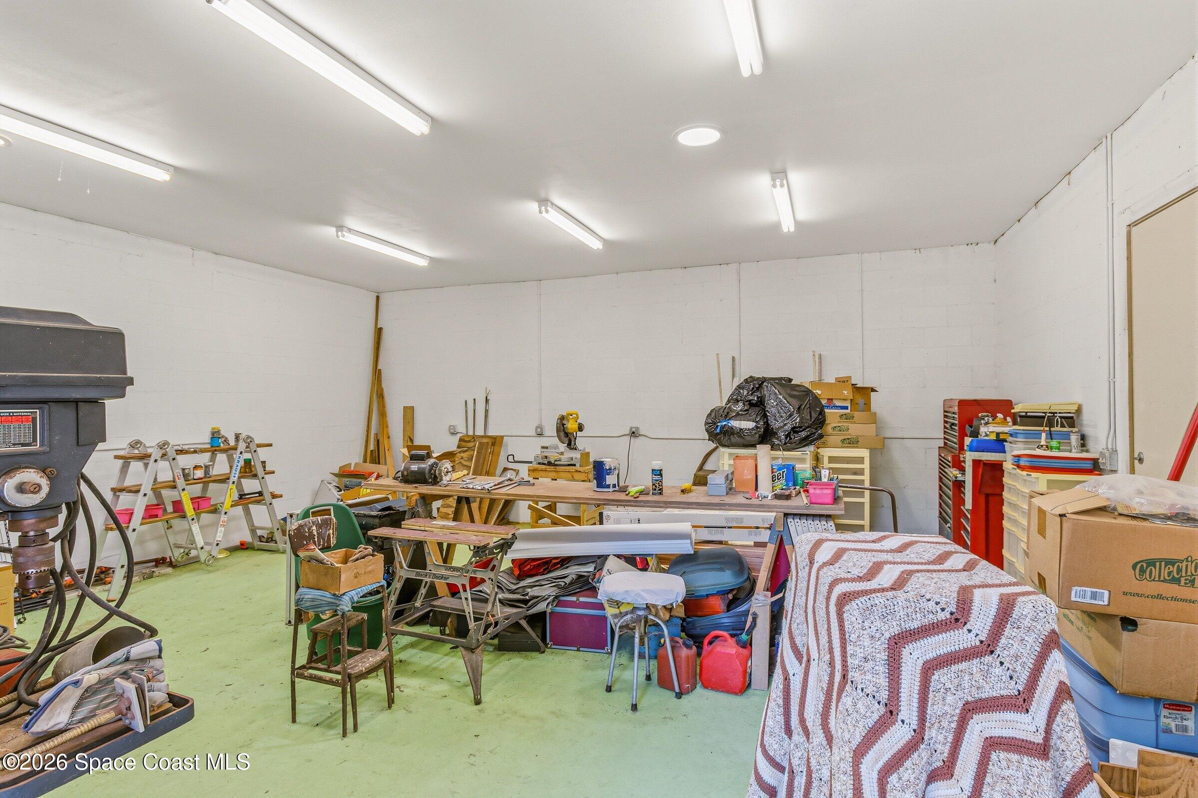 693 West Pine Road Melbourne Village, FL 32904 - Photo 31 of 65 36-693-W-Pine-Workshop 1