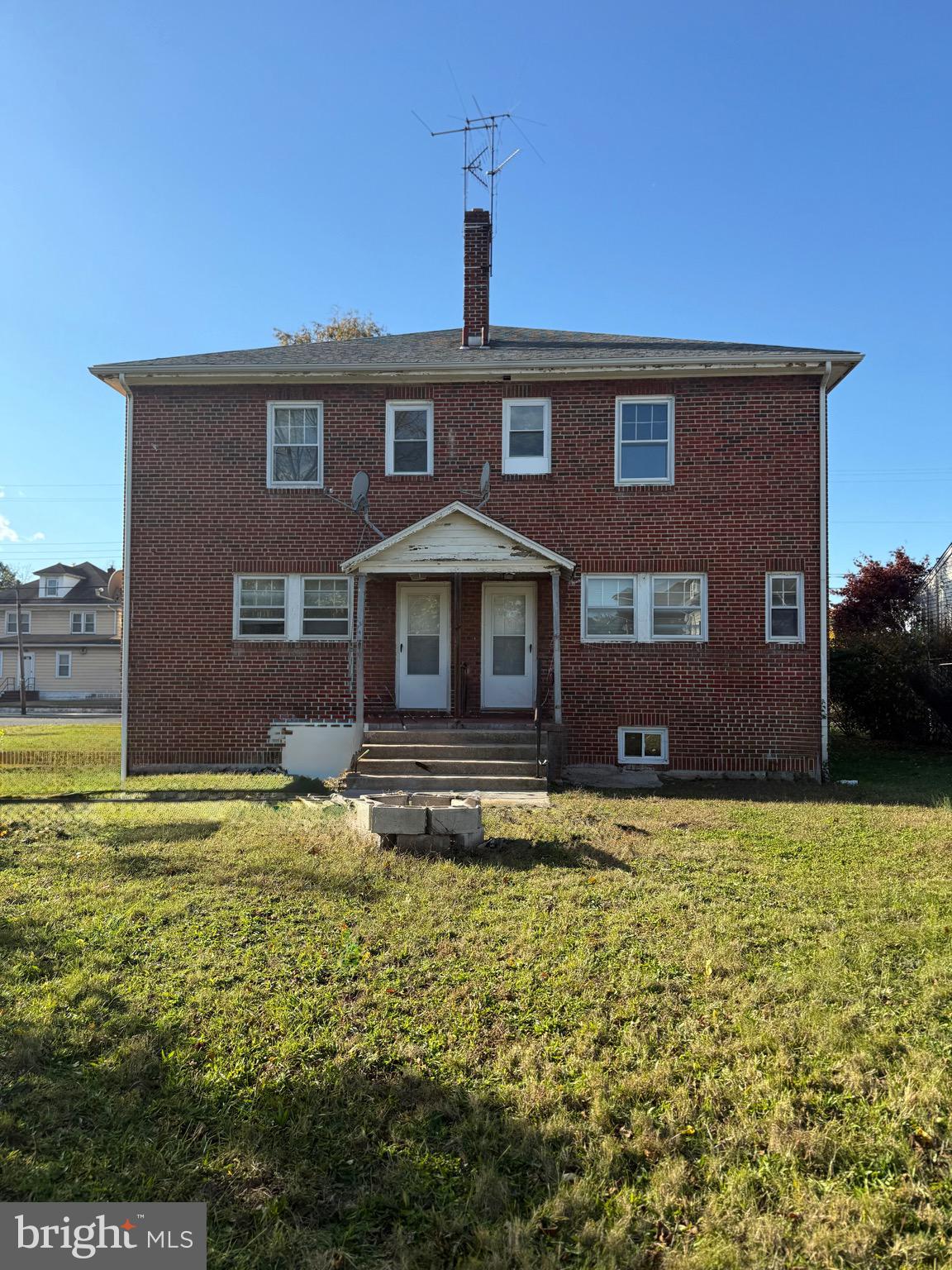 109-111 State Street Penns Grove, NJ 08069 - Photo 19 of 20 a front view of a house with a yard
