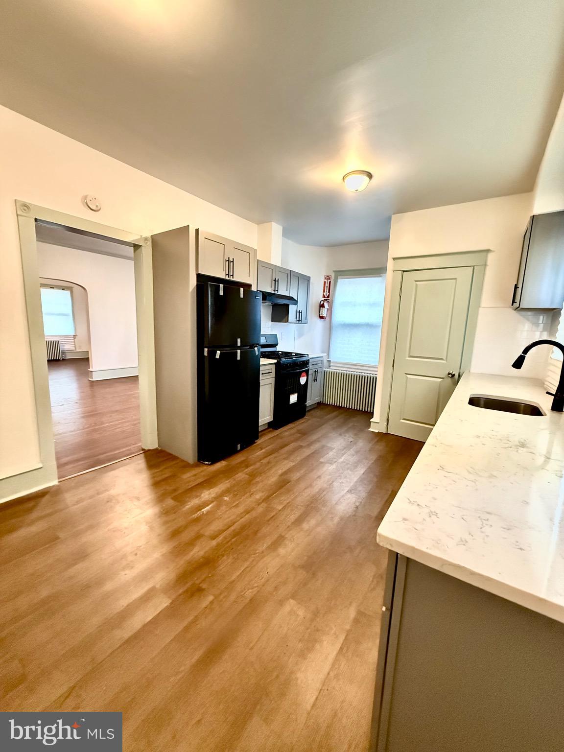 109-111 State Street Penns Grove, NJ 08069 - Photo 5 of 20 a view of a kitchen with a sink