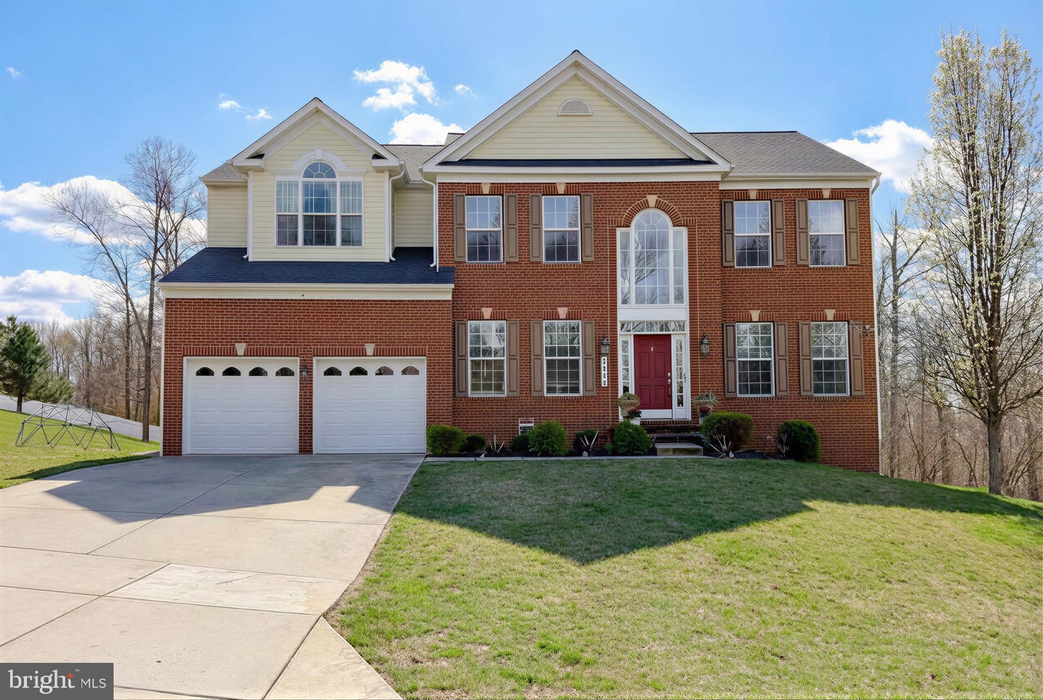 2810 Pumpkin Street Clinton, MD 20735 - Photo 1 of 27 a front view of a house with a yard