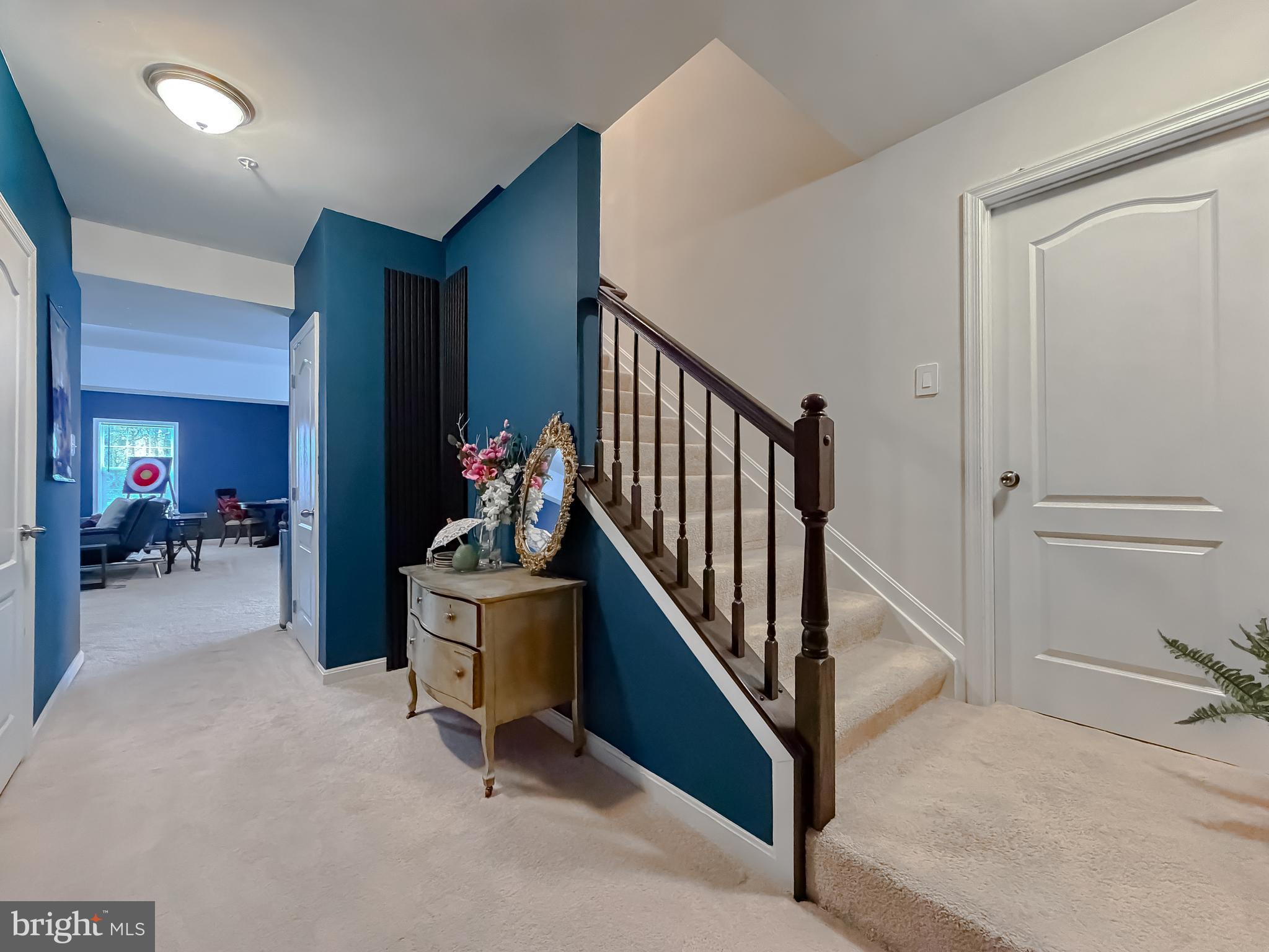 2810 Pumpkin Street Clinton, MD 20735 - Photo 22 of 27 a view of a hallway with workspace to livingroom with furniture and toys