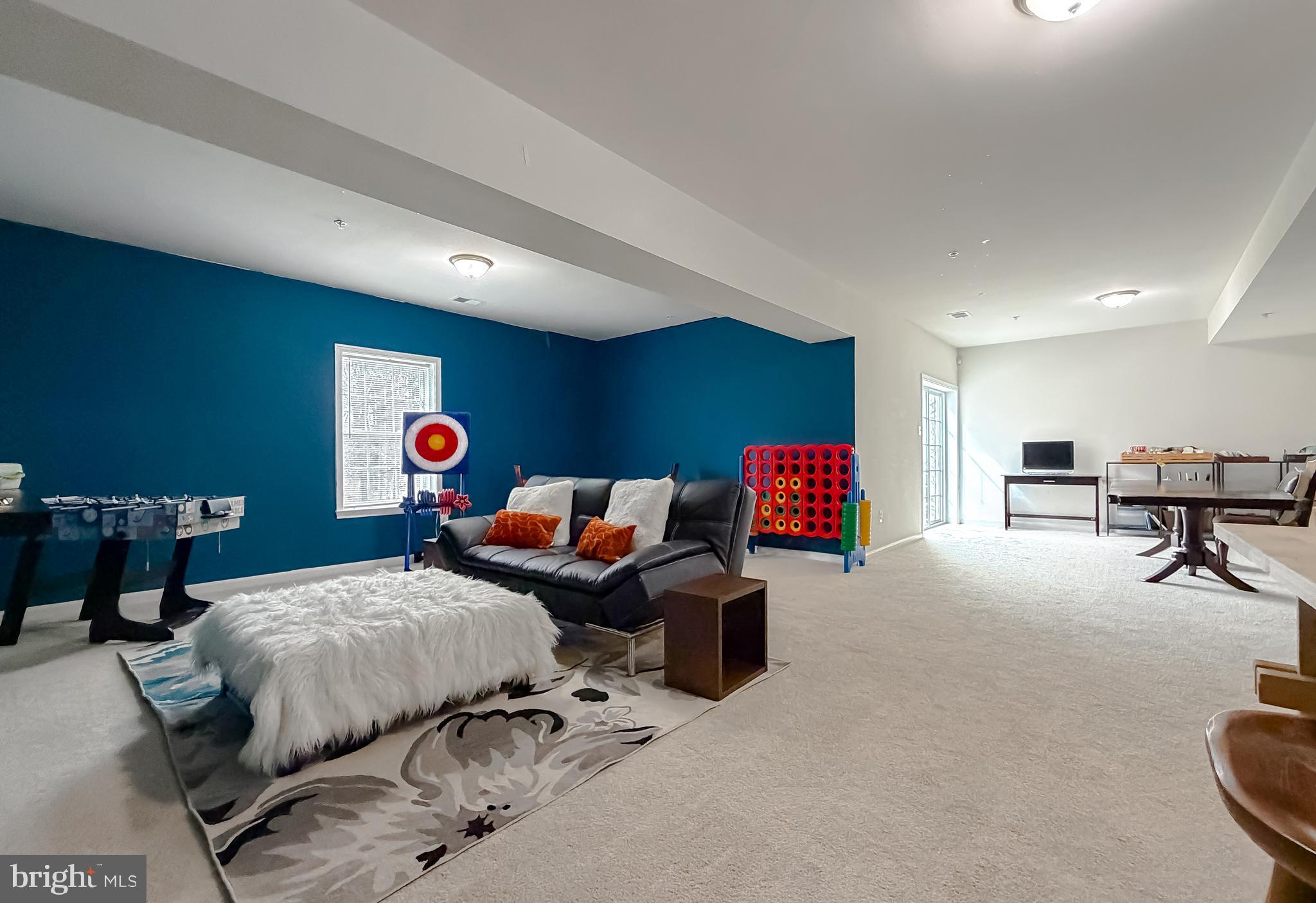 2810 Pumpkin Street Clinton, MD 20735 - Photo 24 of 27 a bedroom with furniture and a table