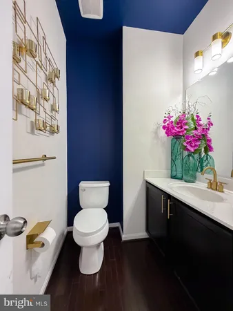 a bathroom with a toilet and a sink