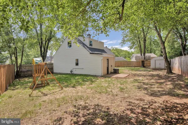 a view of backyard of a house