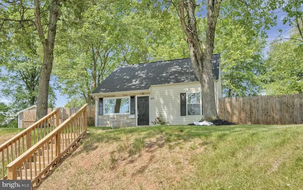 a house with trees in front of it