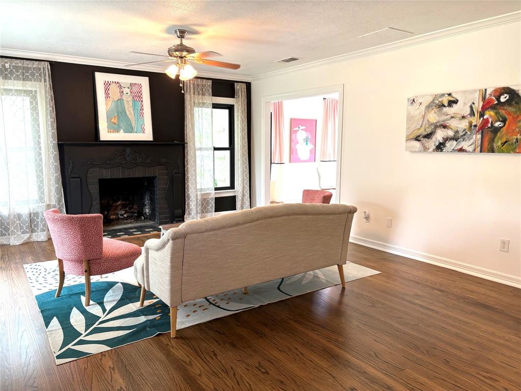 3600 Westcliff Road South Fort Worth, TX 76109 - Photo 9 of 38 a living room with furniture and a fireplace